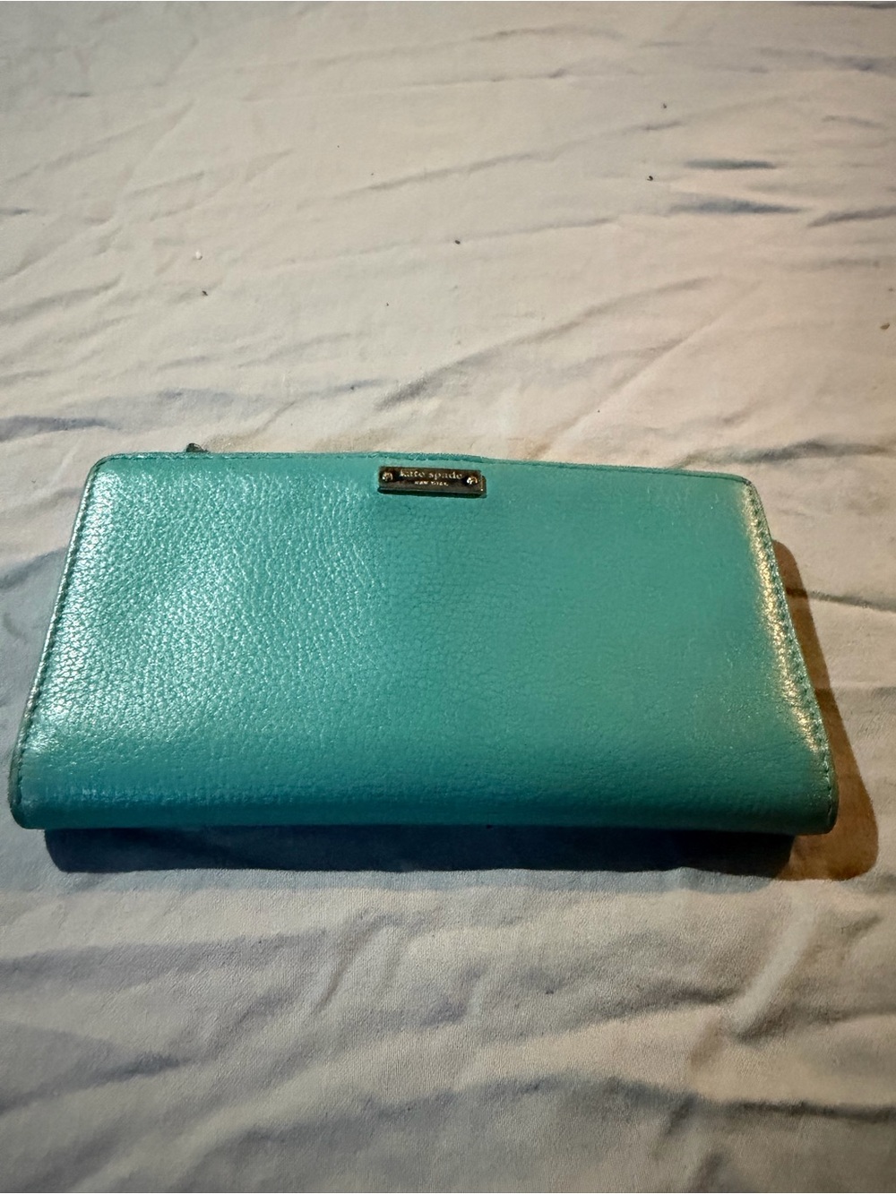 kate spade turquoise zip wallet with logo plaque